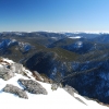 Snow on the ground but blues skies above. The view from the summit of Mt Howitt.